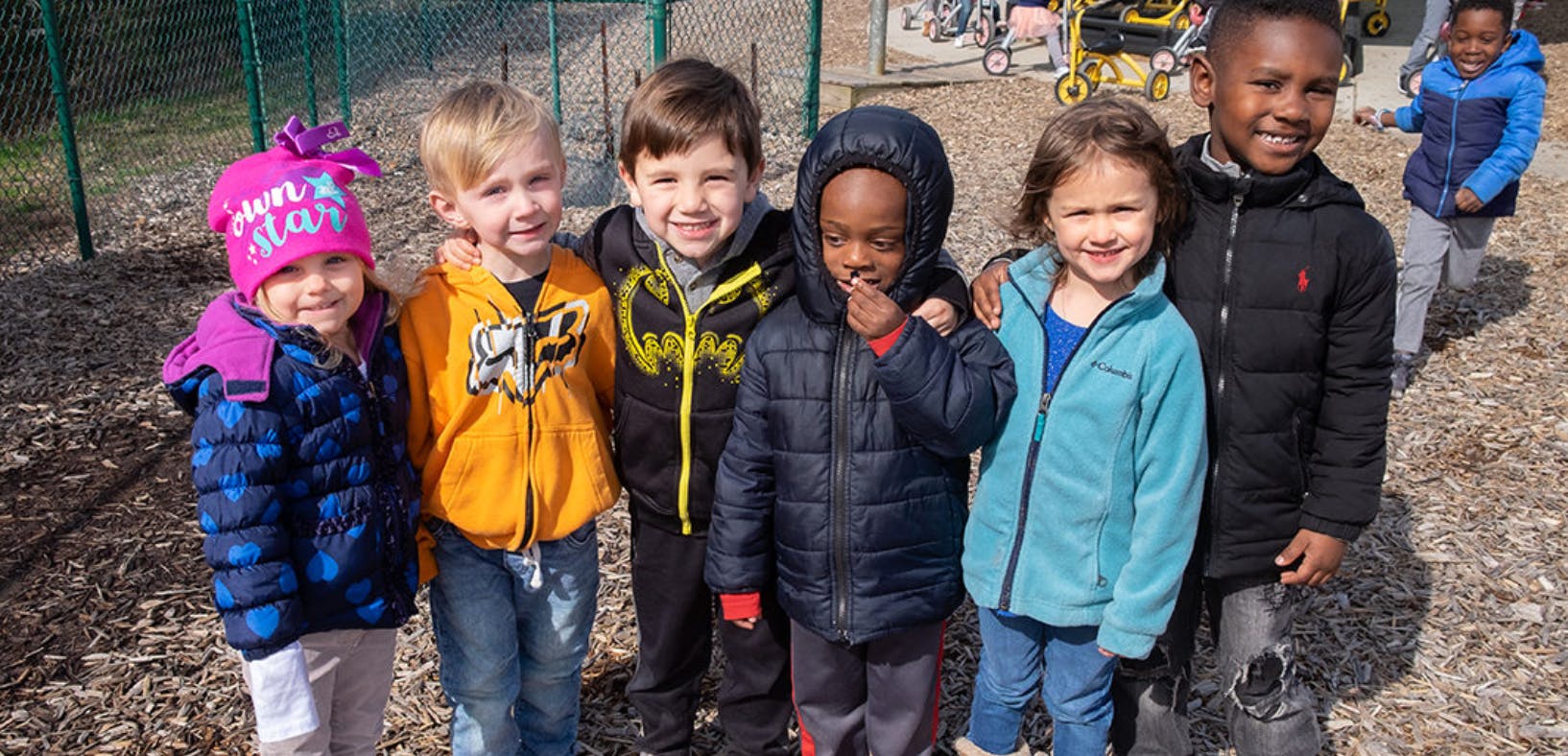 Group of children standing outdoors