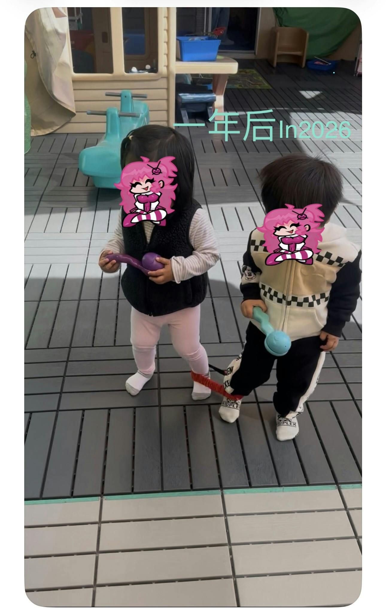 Two children standing, holding colorful toys, on a tiled outdoor surface