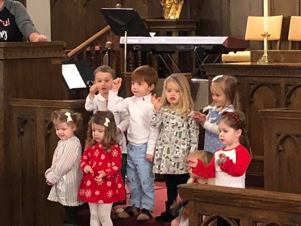 Group of children standing in a church