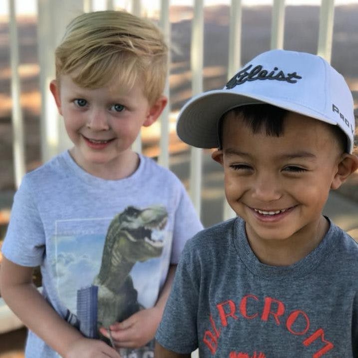 Two children smiling