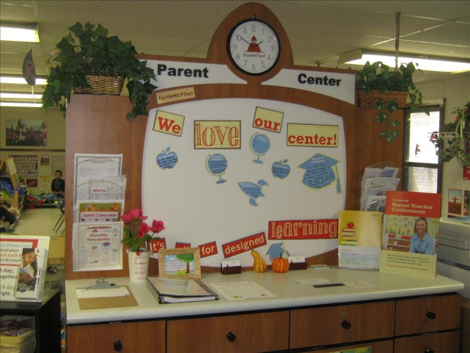 KinderCare parent information display with text "We love our center!"