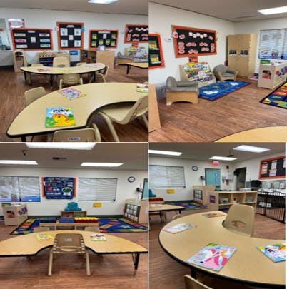 Classroom with child-sized tables and chairs, play area with rugs