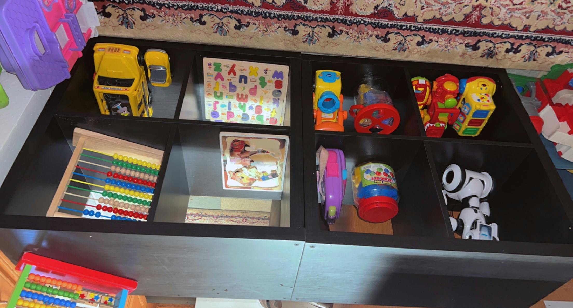 Shelf with various toys and learning materials