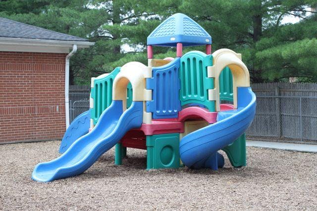 Colorful playground equipment with multiple slides