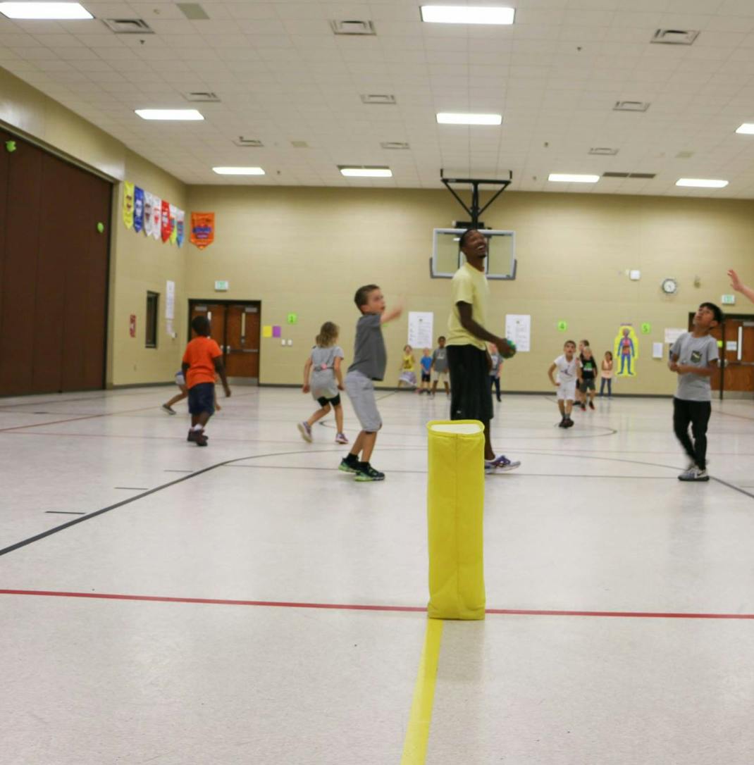 People playing in a gymnasium