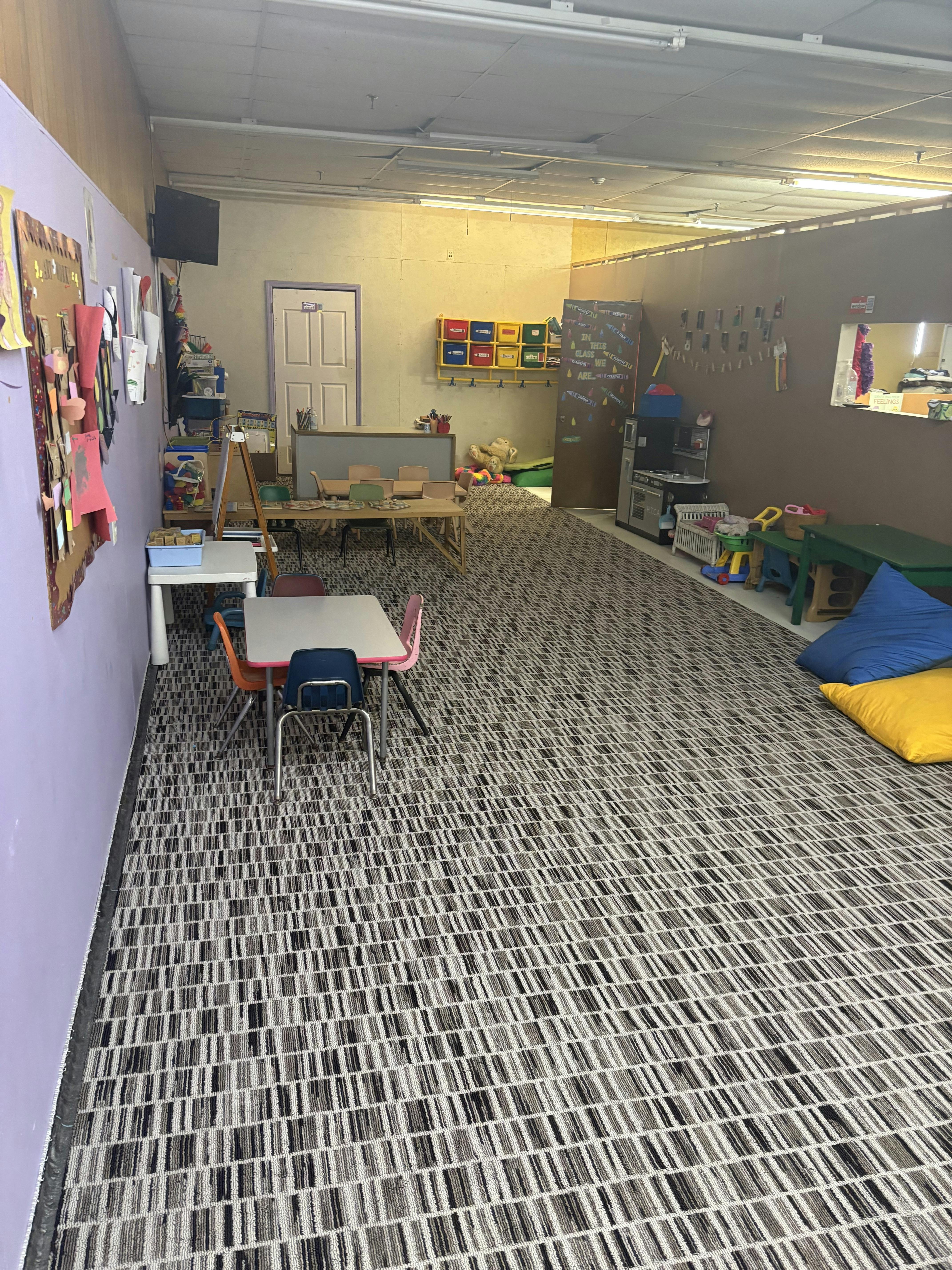 Classroom interior with small tables and chairs for children