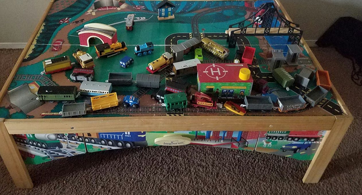 Toy train set on a play table