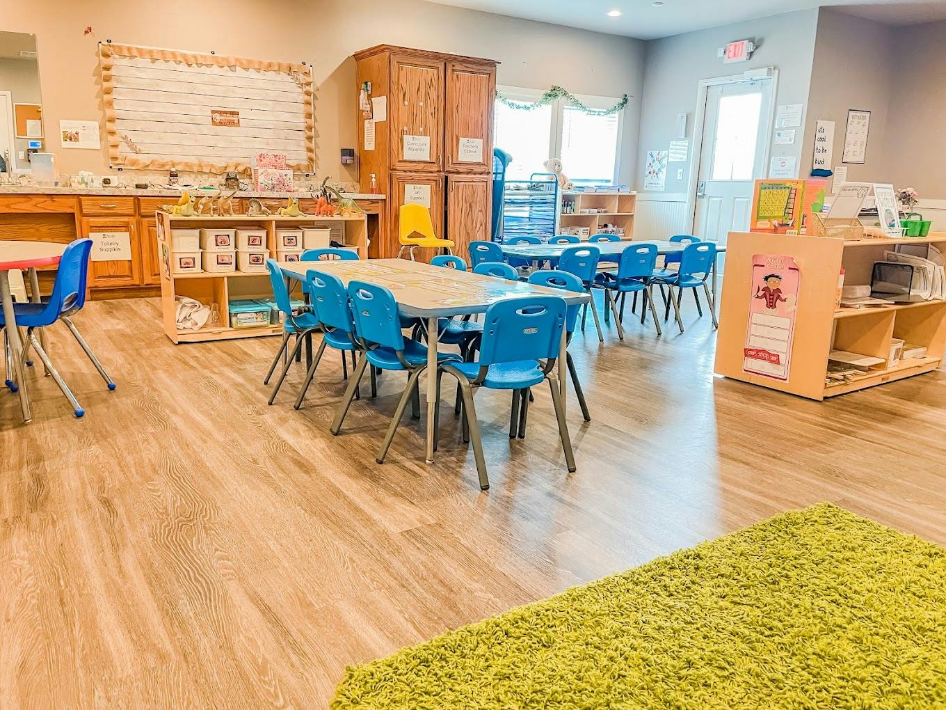 Classroom with tables and blue chairs