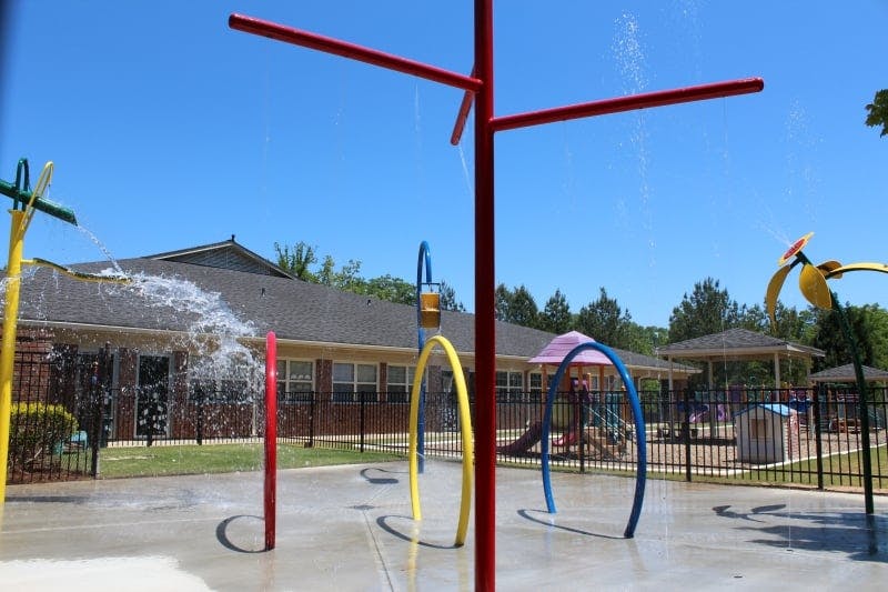 Water spraying from a splash pad