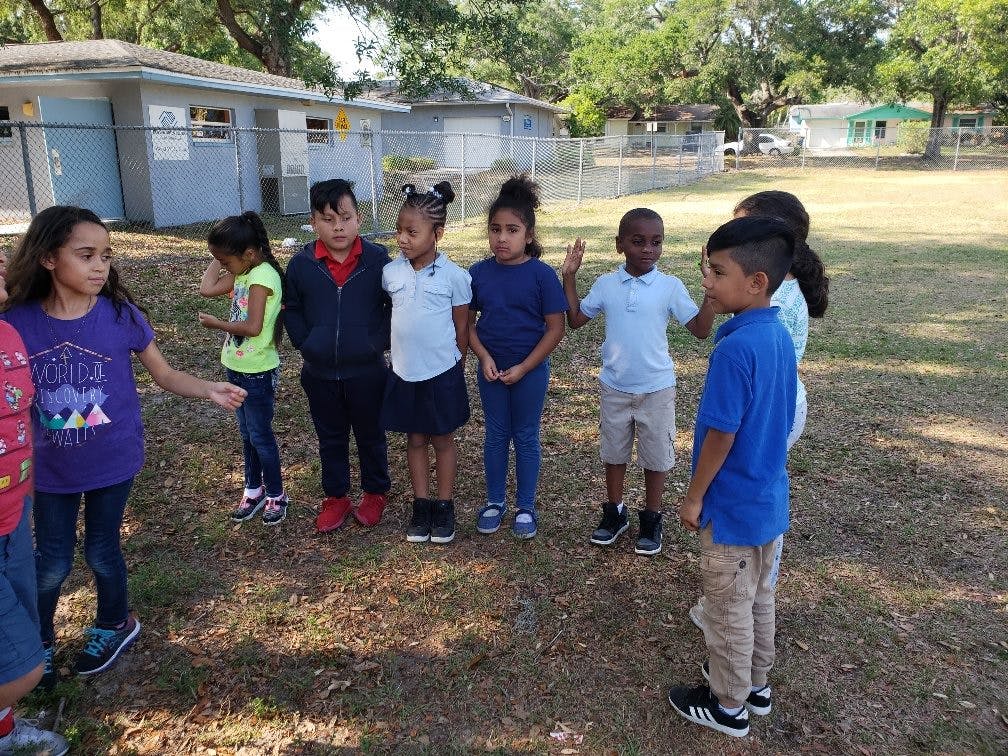 Group of children standing outdoors