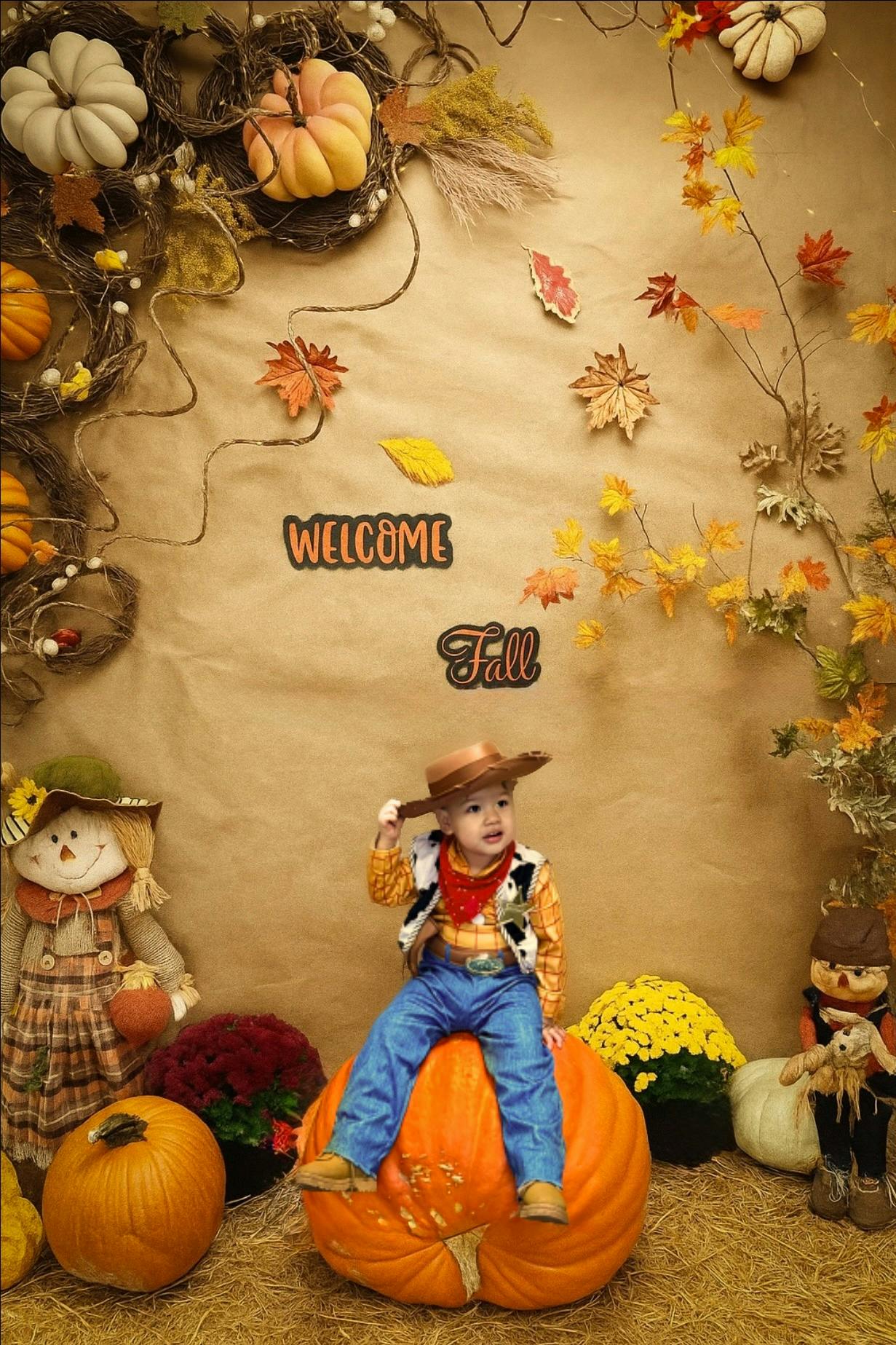 Child in cowboy costume sitting on a large pumpkin with "Welcome Fall" text