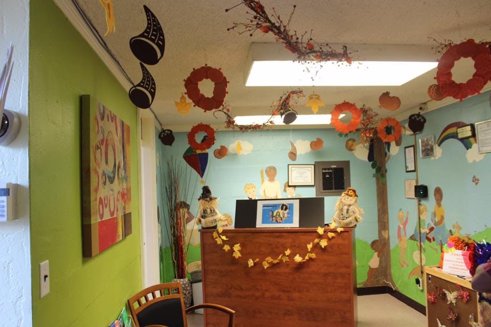 Room decorated with fall and Halloween themed items