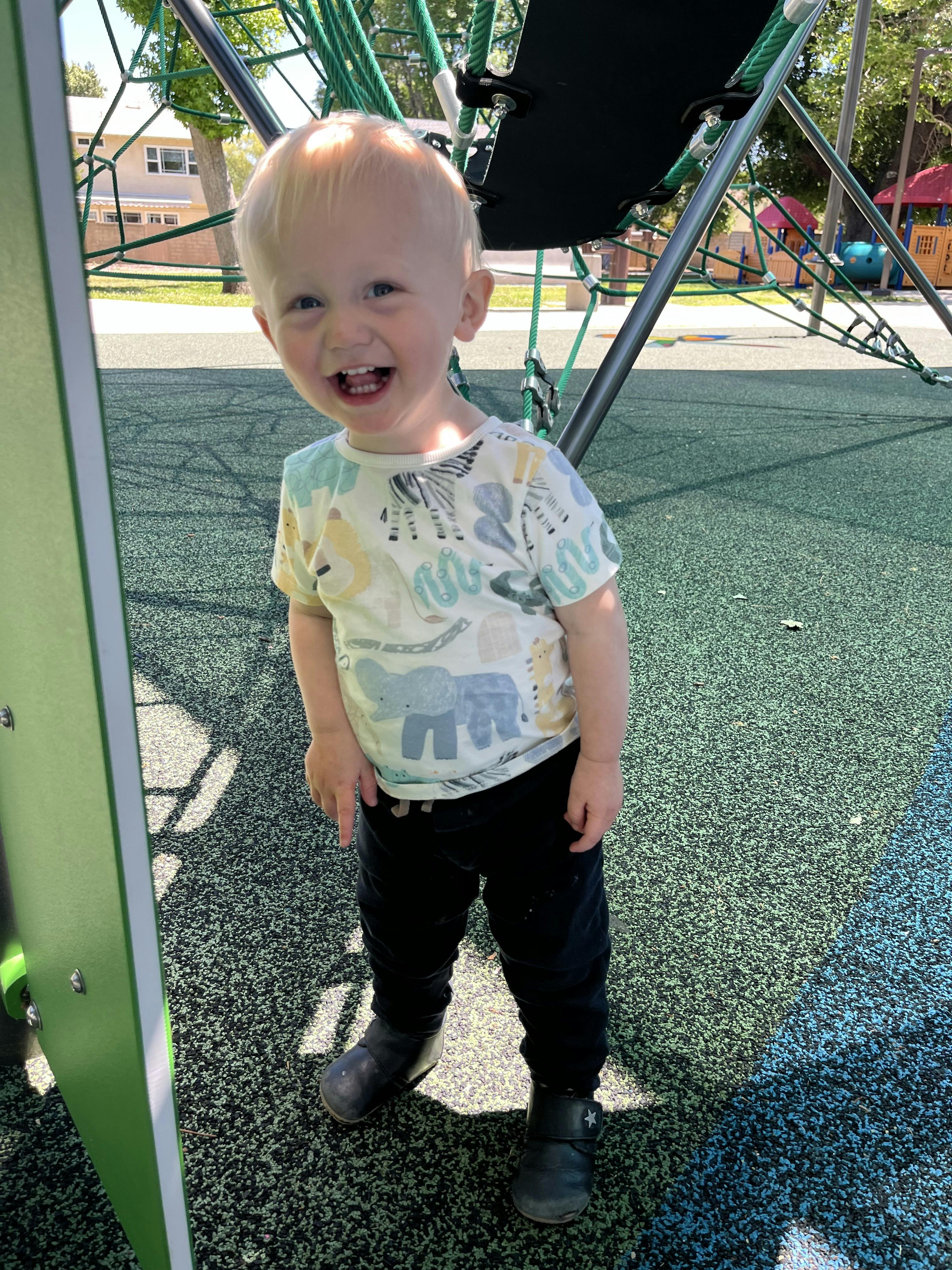 Child standing on a playground