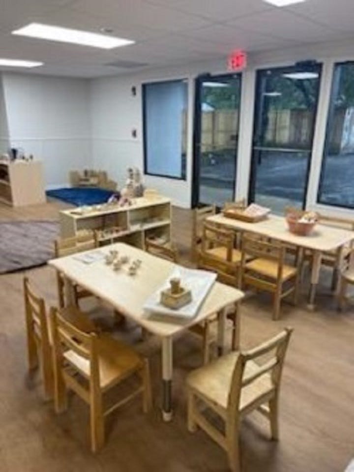 Classroom with child-sized tables and chairs