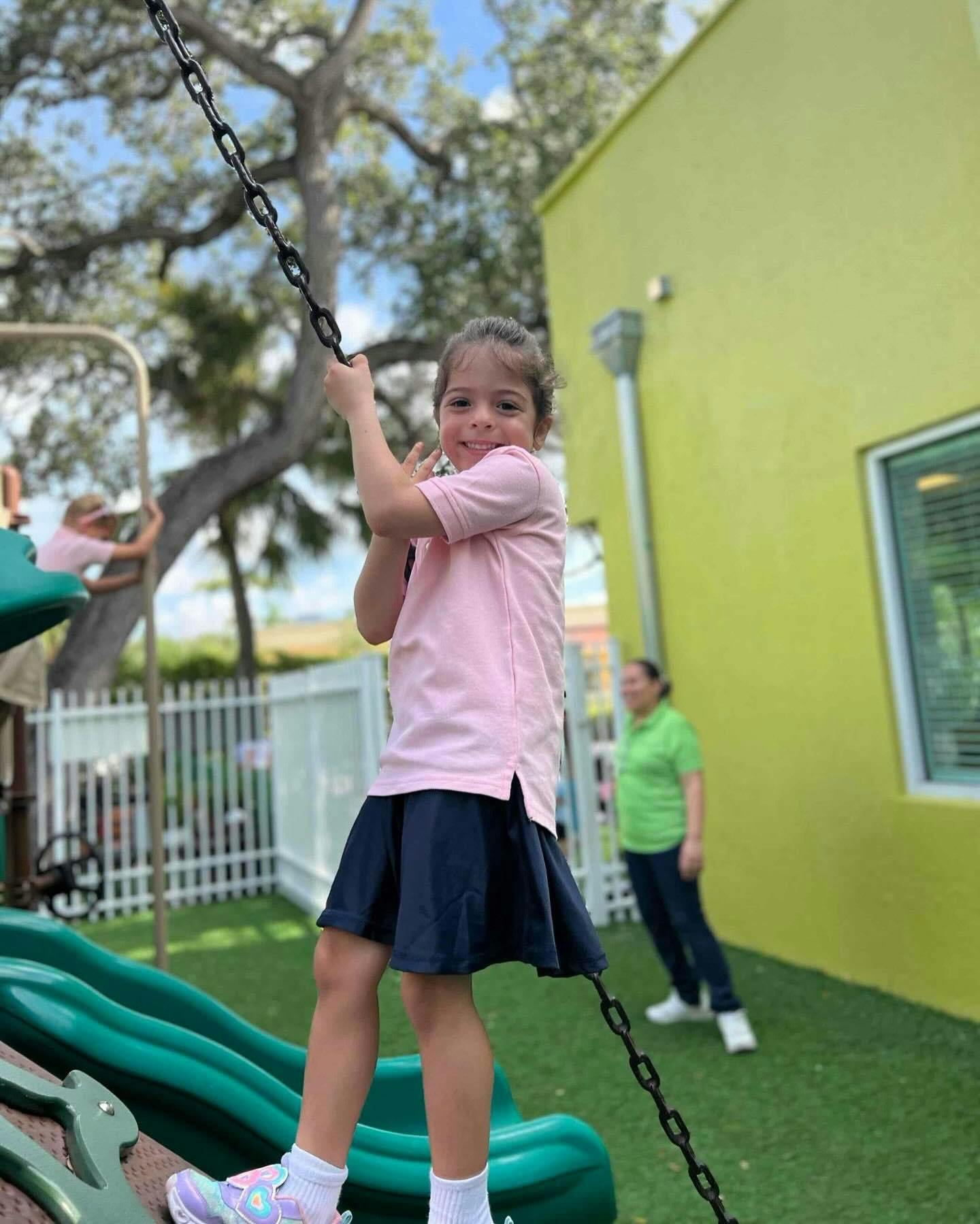 Child climbing on playground equipment