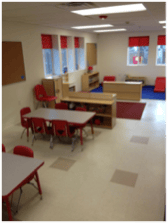 Classroom with small tables and chairs