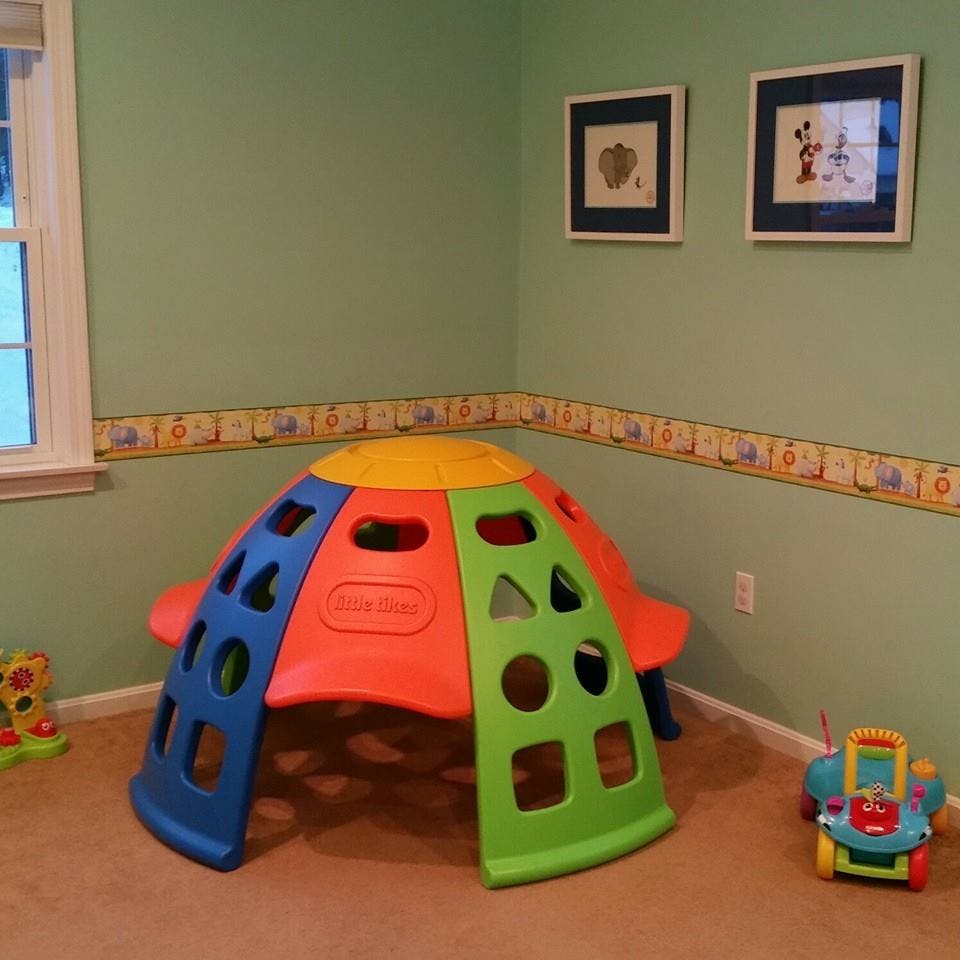 Colorful plastic play dome in a room