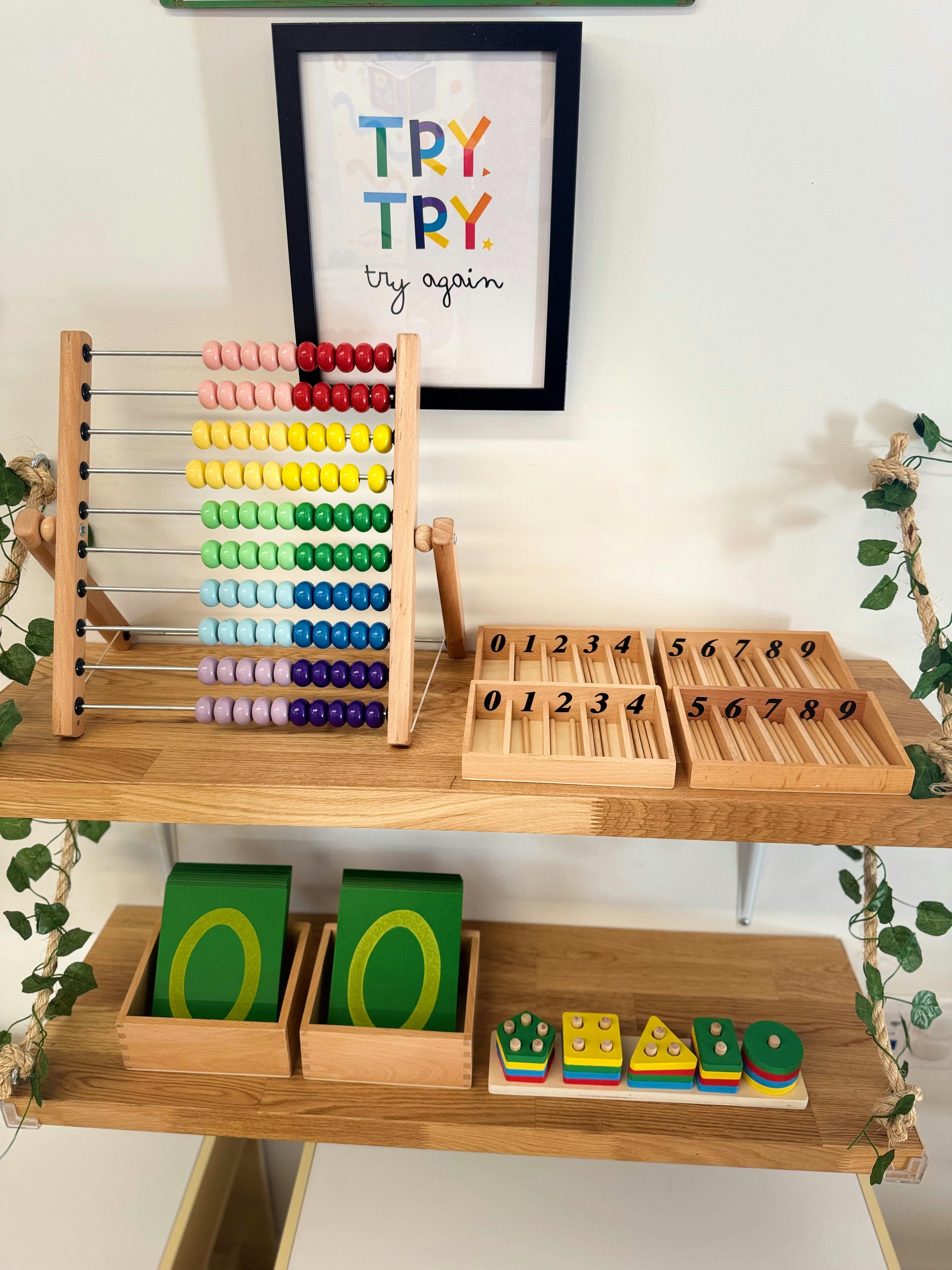 Abacus and other learning toys on wooden shelves