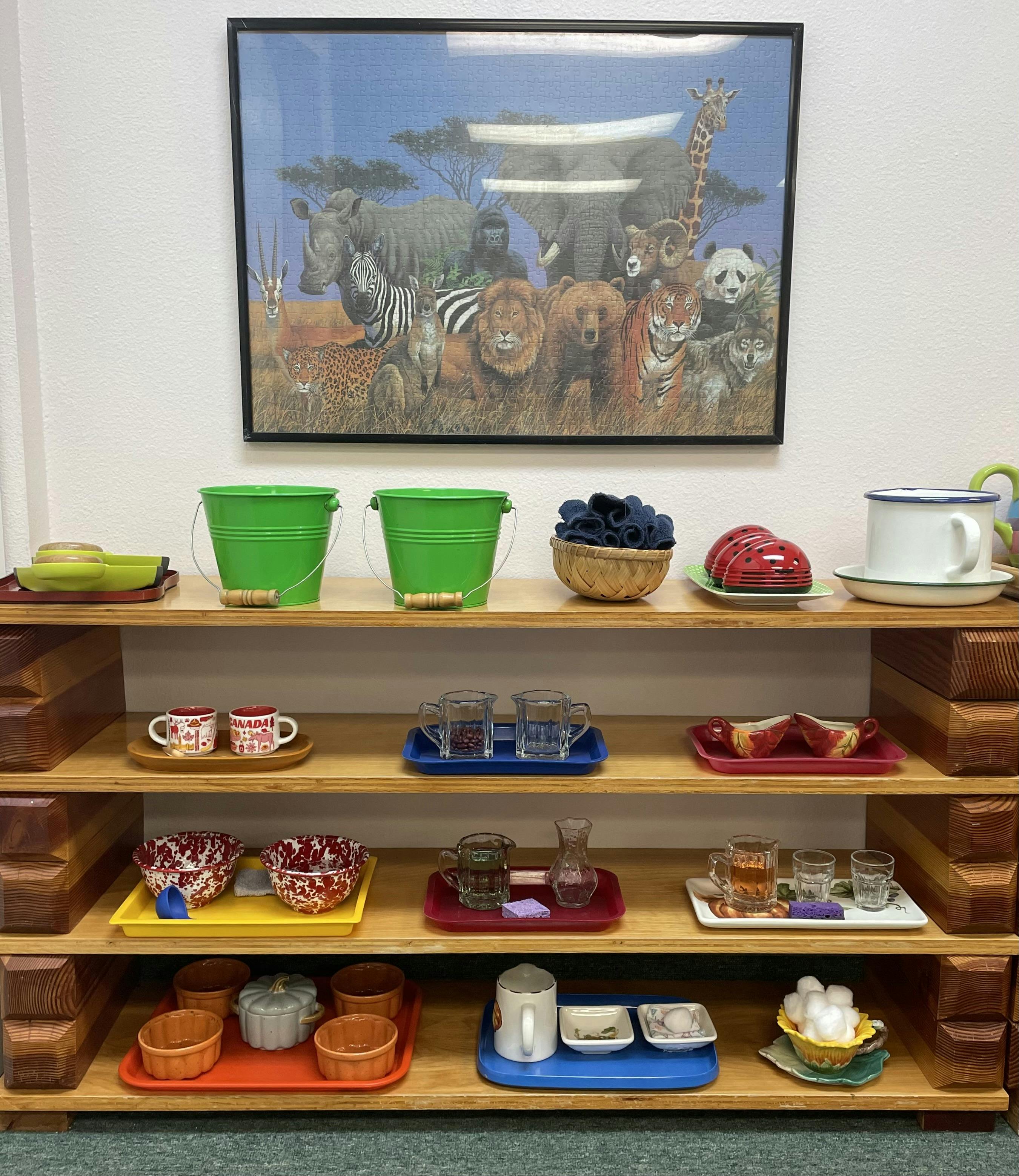 Shelves with various items including green buckets, cups, and bowls