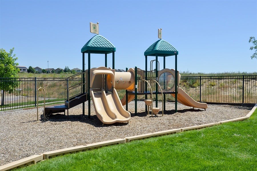 Playground with slides and climbing structures
