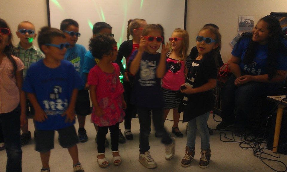 Group of children wearing novelty glasses