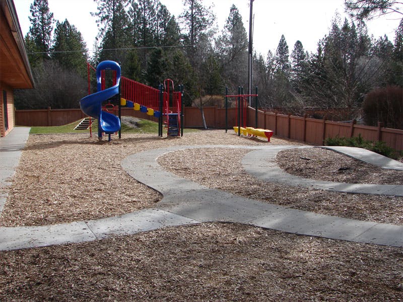 Playground with slides and a winding path