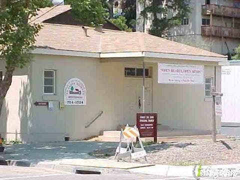 Small building with a sign that reads "Pioneer Baptist Church"