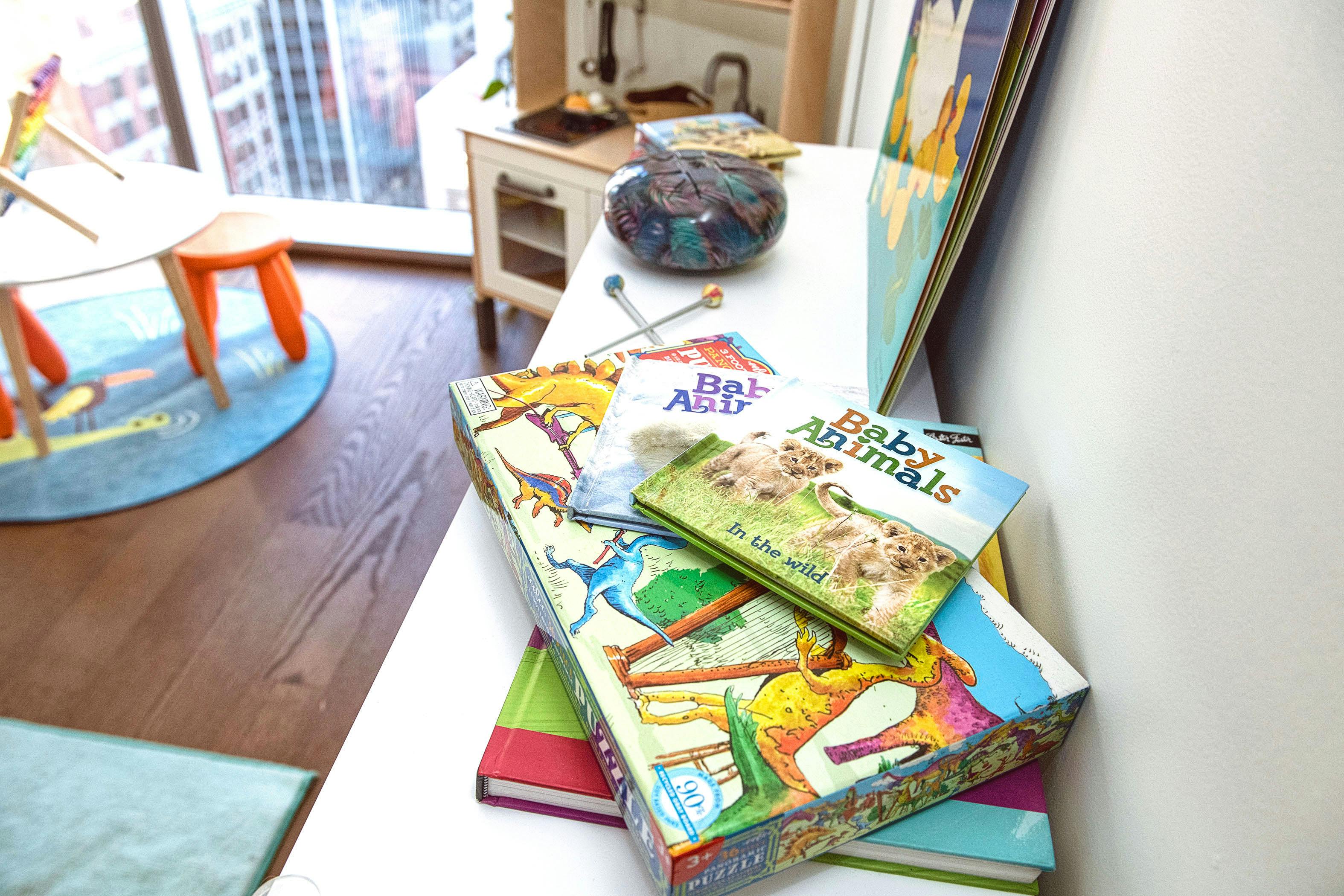 Stack of children's books with colorful covers