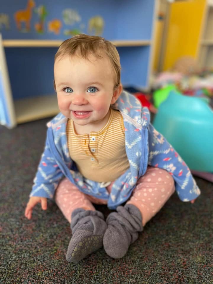 Child sitting on the floor