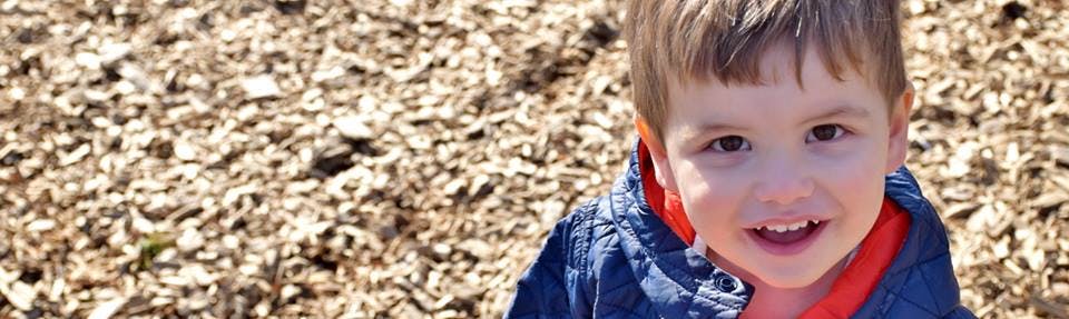 Child looking up at the camera