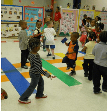 Children playing in a classroom