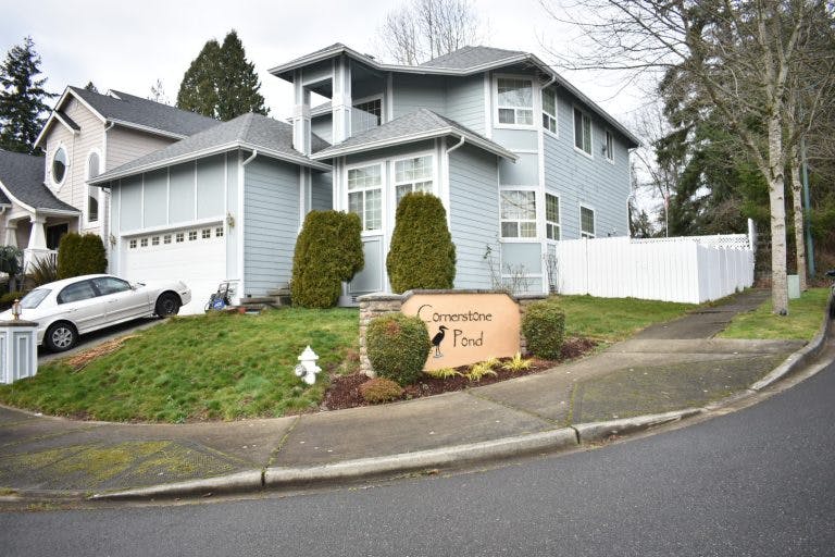 House with a sign that reads "Clementine Court"