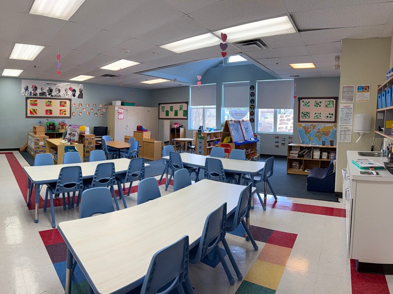 Empty classroom with tables and chairs