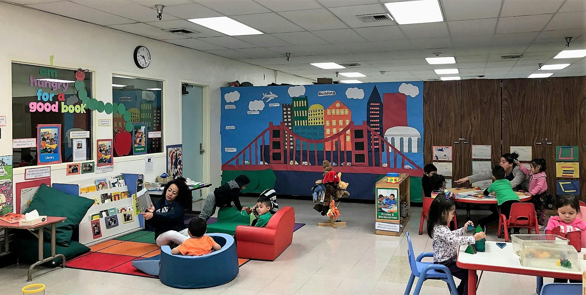 Children playing and reading in a classroom
