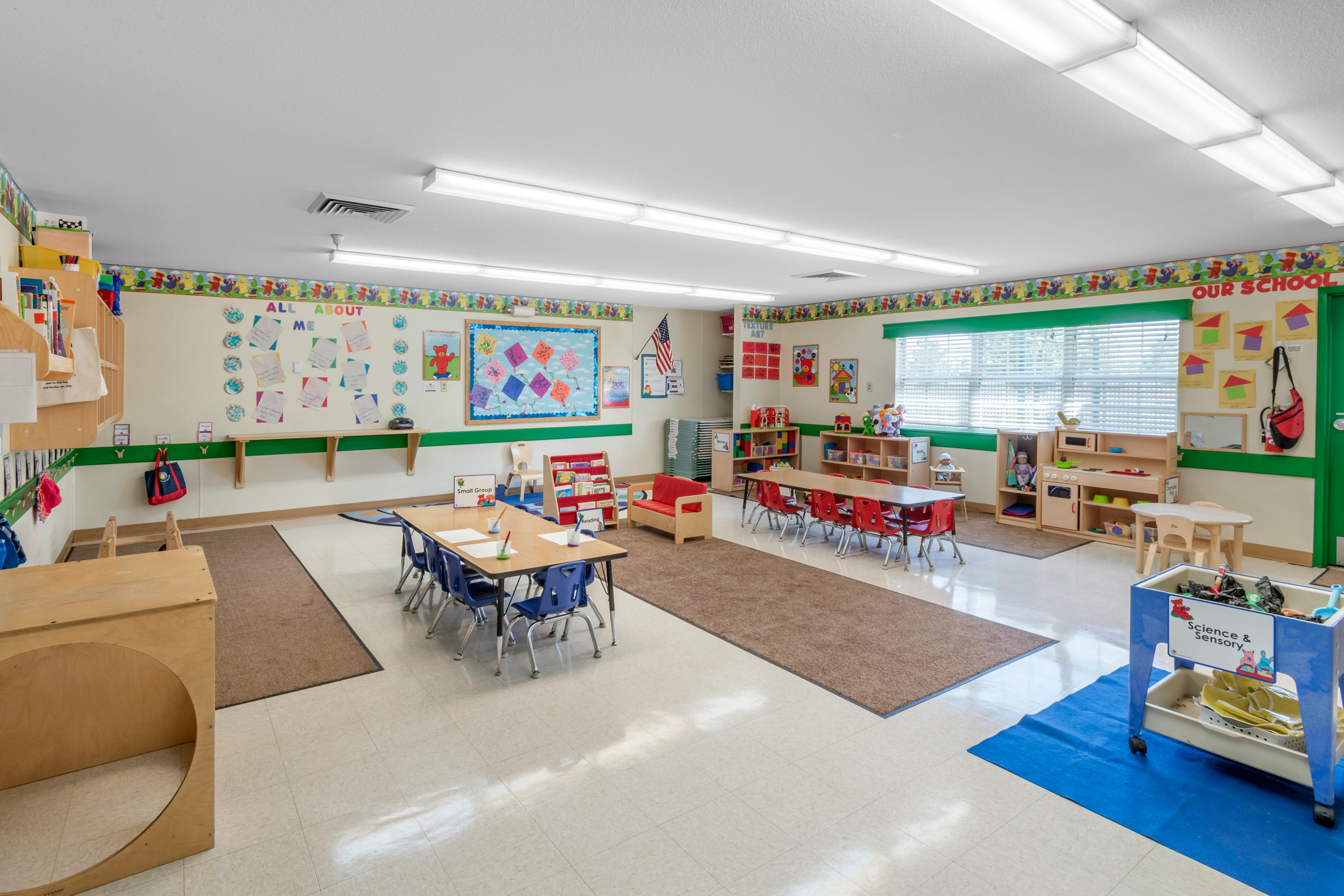 An empty early childhood classroom with colorful decorations