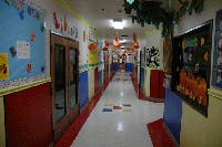 Empty school hallway decorated with student artwork