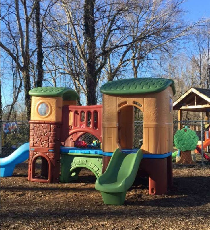 Playground structure with slides and climbing areas