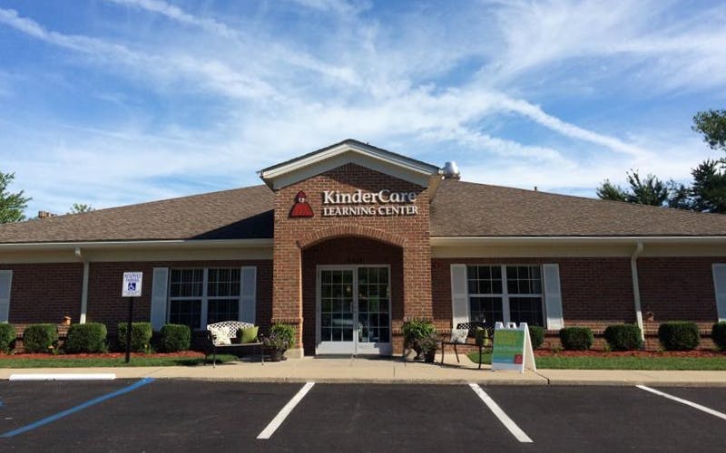 KinderCare Learning Center building exterior from the parking lot with sky above