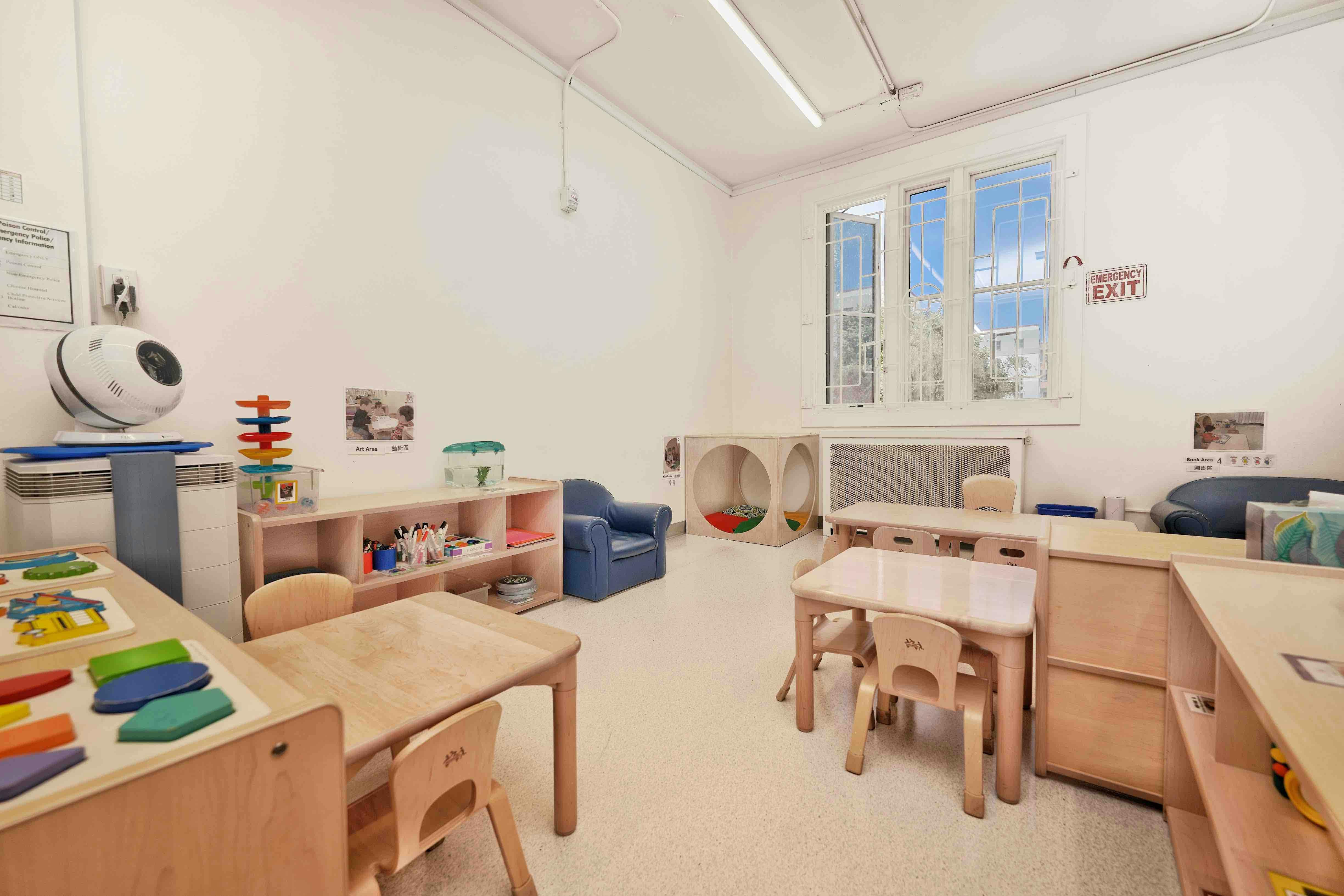 Classroom interior with small tables and chairs for children