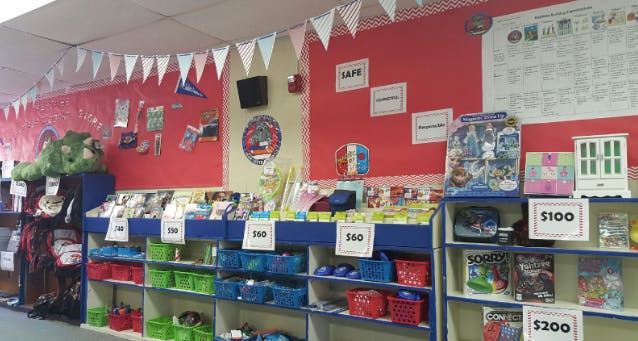 School store with items on shelves and price tags