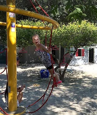 Child on a swing set