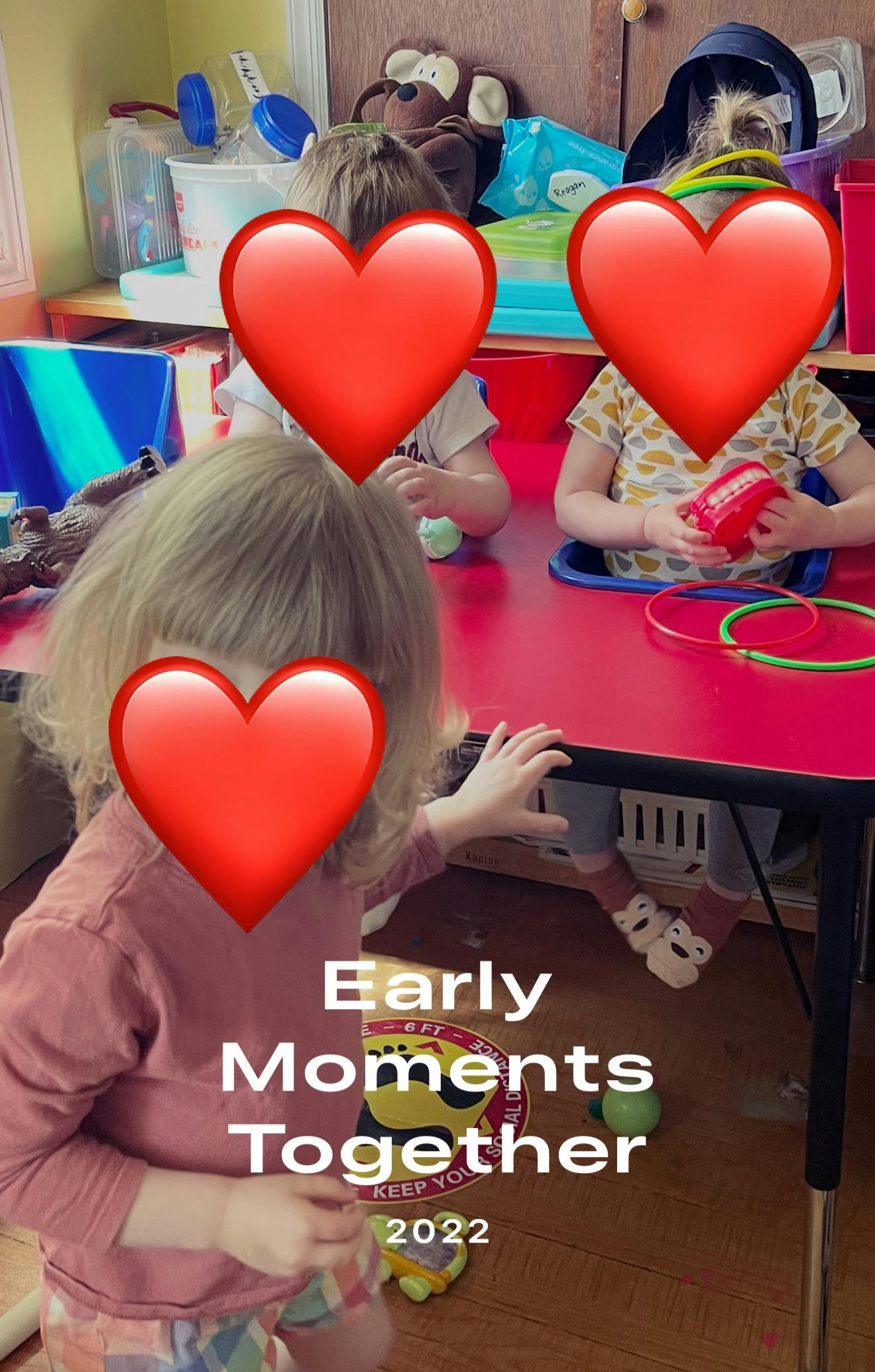 Children at a table with toys