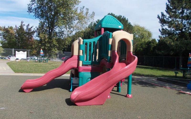 Playground equipment with two slides