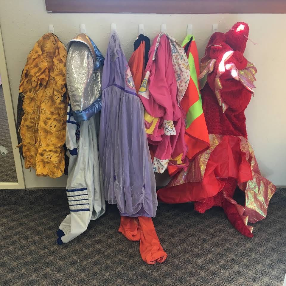 Costumes hanging on hooks
