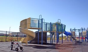 Playground with slides and climbing structures
