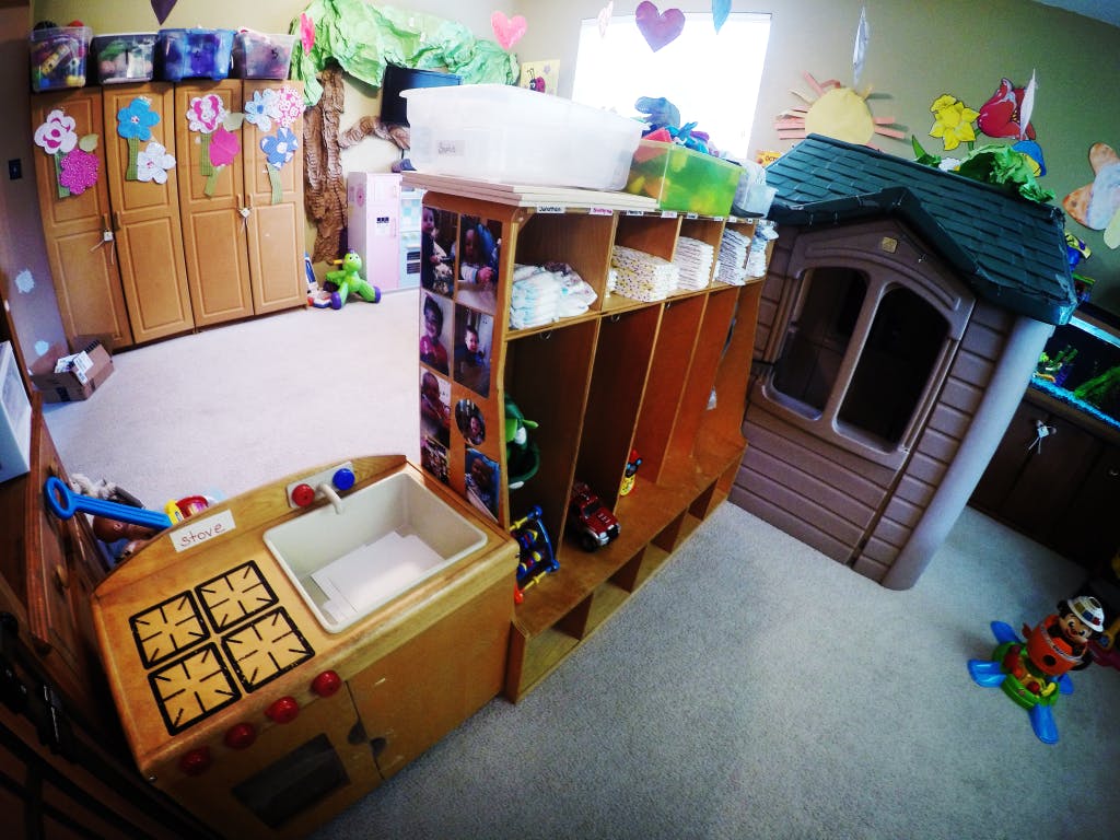 Play kitchen and playhouse in a room