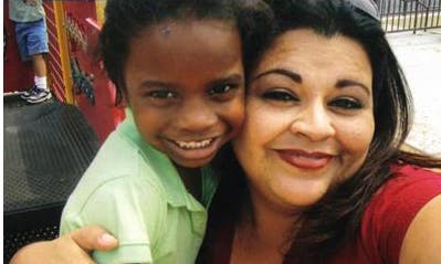 Person and child smiling