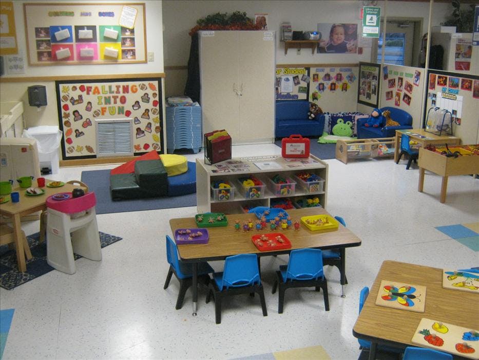 An empty early childhood classroom with multiple activity stations