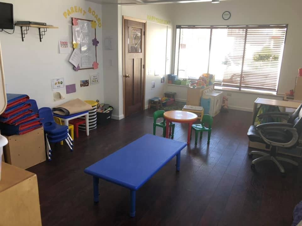 Classroom with small tables and chairs