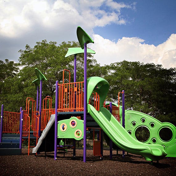Playground structure with slides and climbing areas